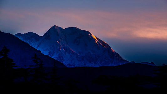 Dramatic dark mountains of Hindu Kush representing mystical landscape of Chitral valley and its rich folklore and cultural heritage